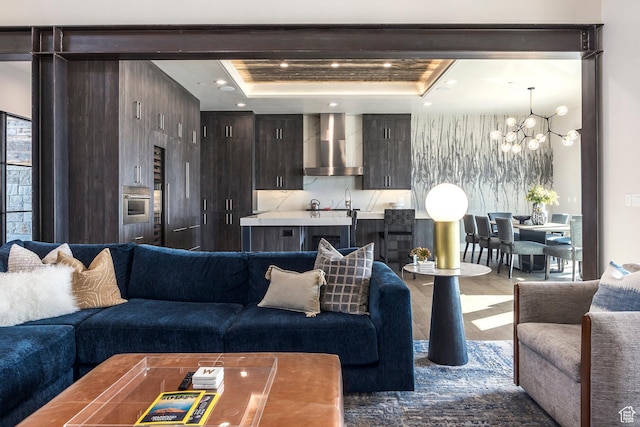 149 N Haystack Mountain Dr, Heber City, UT 84032 - living area with a chandelier, a tray ceiling, dark wood-style flooring, and recessed lighting