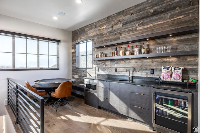149 N Haystack Mountain Dr, Heber City, UT 84032 - indoor wet bar with wine cooler, wood finished floors, and recessed lighting