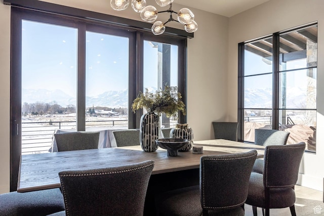 149 N Haystack Mountain Dr, Heber City, UT 84032 - dining area featuring a mountain view and a chandelier