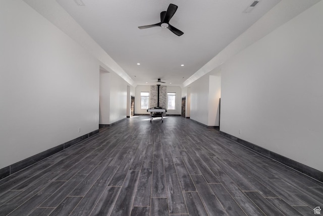 7748 W Mountain Dell Dr, Vernal, UT 84078 - unfurnished living room featuring dark wood-type flooring and ceiling fan
