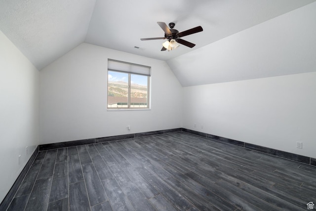 7748 W Mountain Dell Dr, Vernal, UT 84078 - additional living space featuring dark wood-type flooring, ceiling fan, and lofted ceiling