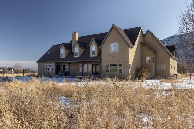 7748 W Mountain Dell Dr, Vernal, UT 84078 - view of snow covered house
