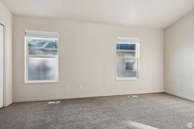 view of carpeted spare room