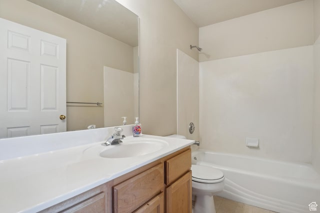 full bathroom with tile patterned flooring, vanity,  shower combination, and toilet
