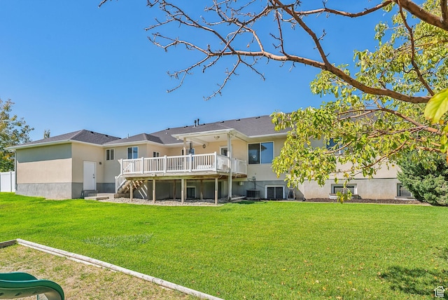 12159 S Swensen Cir, Riverton, UT 84096 - back of house featuring a wooden deck, stairway, central air condition unit, a yard, and stucco siding