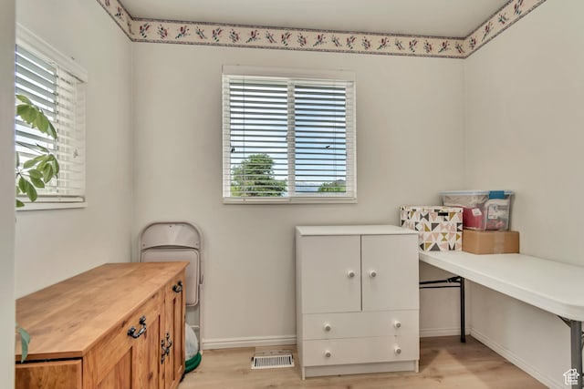 12159 S Swensen Cir, Riverton, UT 84096 - office area with plenty of natural light, light wood finished floors, and baseboards