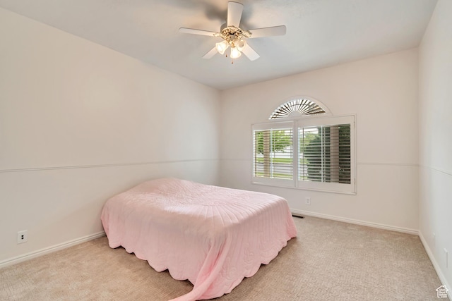 12159 S Swensen Cir, Riverton, UT 84096 - bedroom with light carpet, baseboards, and ceiling fan