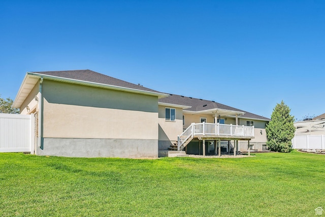 12159 S Swensen Cir, Riverton, UT 84096 - back of house featuring a deck, stairway, stucco siding, and a shingled roof