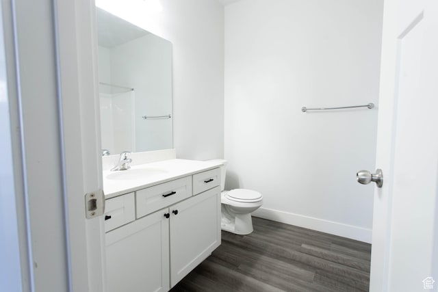 1454 N 3830 W Unit D201, Lehi, UT 84043 - bathroom featuring a shower, wood finished floors, baseboards, vanity, and toilet