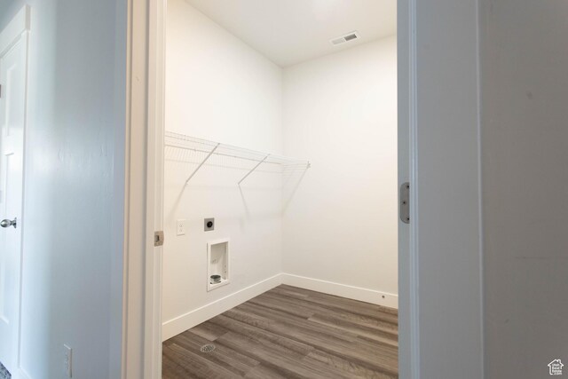 1454 N 3830 W Unit D201, Lehi, UT 84043 - washroom featuring laundry area, baseboards, dark wood-type flooring, hookup for an electric dryer, and visible vents