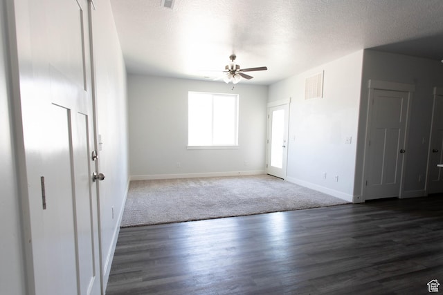 1454 N 3830 W Unit D201, Lehi, UT 84043 - unfurnished bedroom featuring a textured ceiling, baseboards, visible vents, and wood finished floors