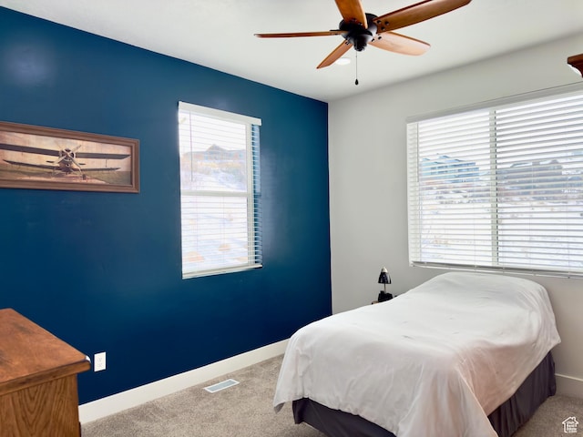 1610 N Mackinaw Way, Garden City, UT 84028 - bedroom with baseboards, carpet floors, and visible vents