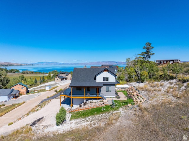 1610 N Mackinaw Way, Garden City, UT 84028 - view of front facade with a water and mountain view