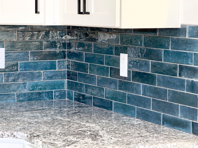 1610 N Mackinaw Way, Garden City, UT 84028 - details with white cabinets and stone counters