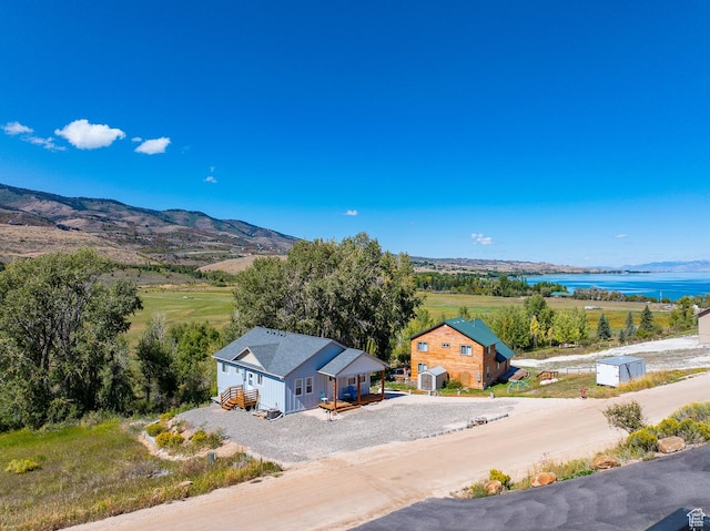 1610 N Mackinaw Way, Garden City, UT 84028 - drone / aerial view with a water and mountain view