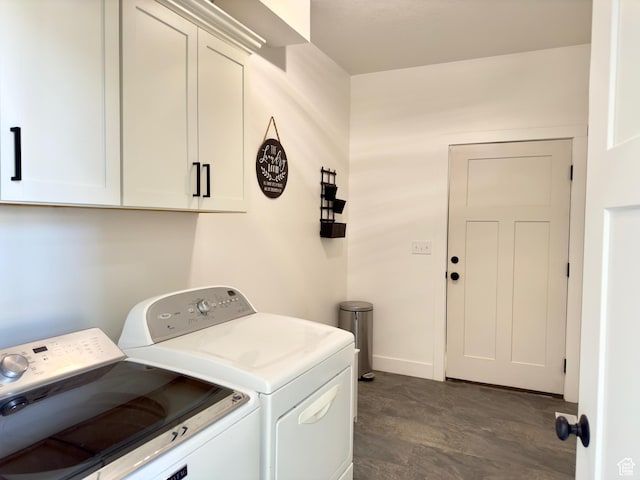 1610 N Mackinaw Way, Garden City, UT 84028 - laundry room with baseboards, washing machine and dryer, and cabinet space