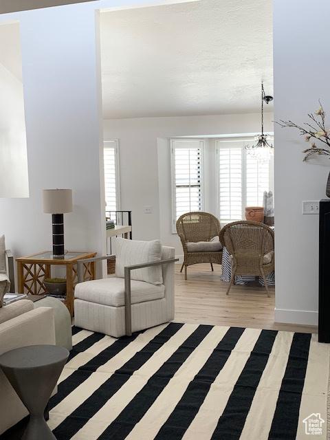 1107 E Brigadoon Ct, Holladay, UT 84117 - living area with a chandelier and light wood-type flooring