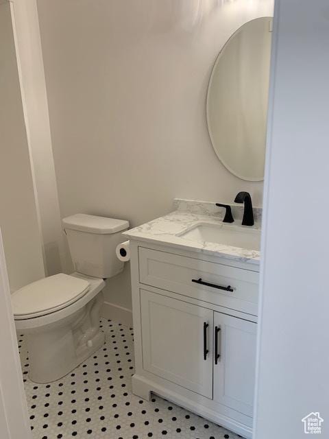 bathroom with vanity and toilet