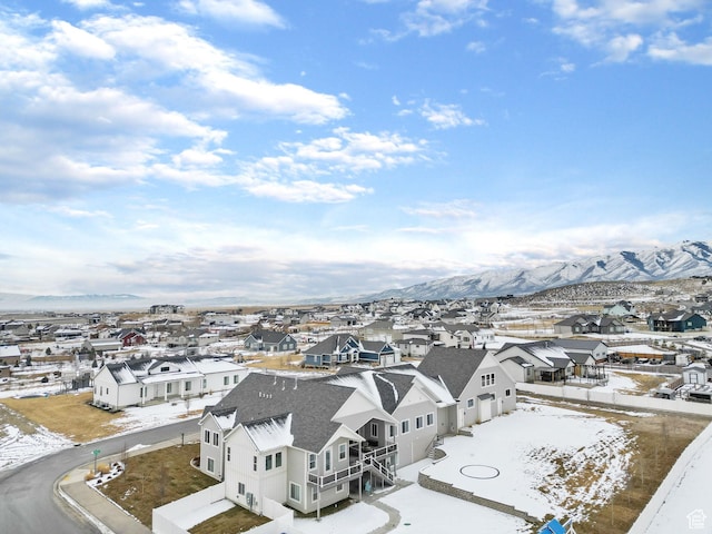 1595 E Duggan Dr, Eagle Mountain, UT 84005 - snowy aerial view featuring a mountain view