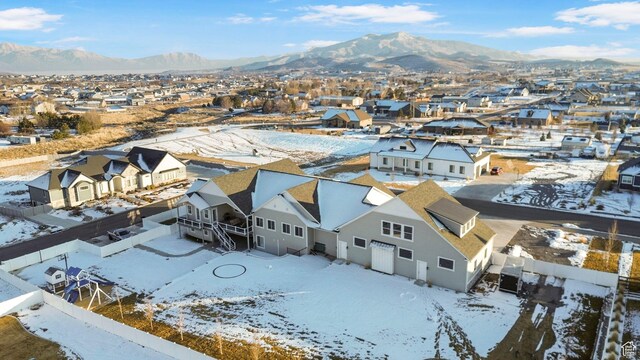 1595 E Duggan Dr, Eagle Mountain, UT 84005 - snowy aerial view featuring a mountain view