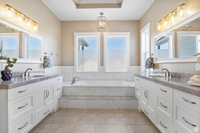 1595 E Duggan Dr, Eagle Mountain, UT 84005 - bathroom featuring vanity and tiled tub