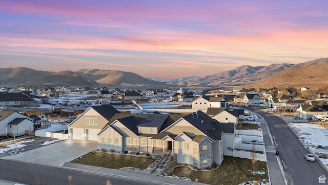 1595 E Duggan Dr, Eagle Mountain, UT 84005 - aerial view at dusk featuring a mountain view