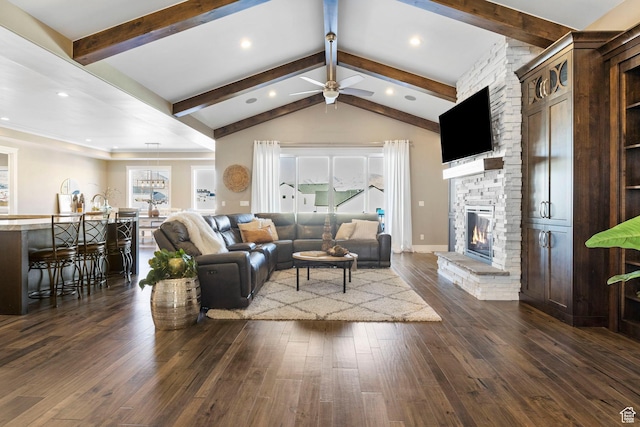 1595 E Duggan Dr, Eagle Mountain, UT 84005 - living room featuring dark wood-type flooring, ceiling fan, a fireplace, and lofted ceiling with beams