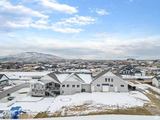 1595 E Duggan Dr, Eagle Mountain, UT 84005 - snowy aerial view featuring a mountain view