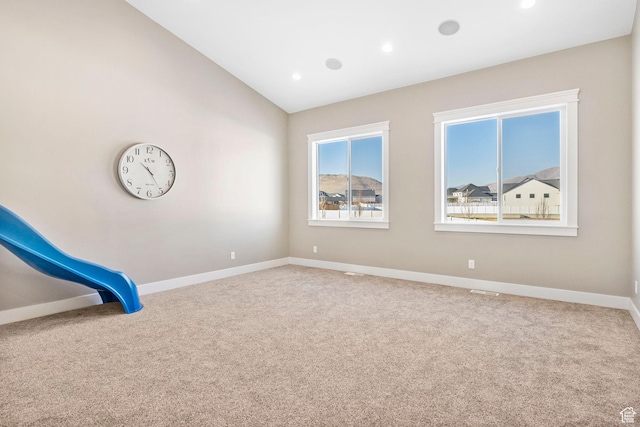 1595 E Duggan Dr, Eagle Mountain, UT 84005 - carpeted empty room with vaulted ceiling