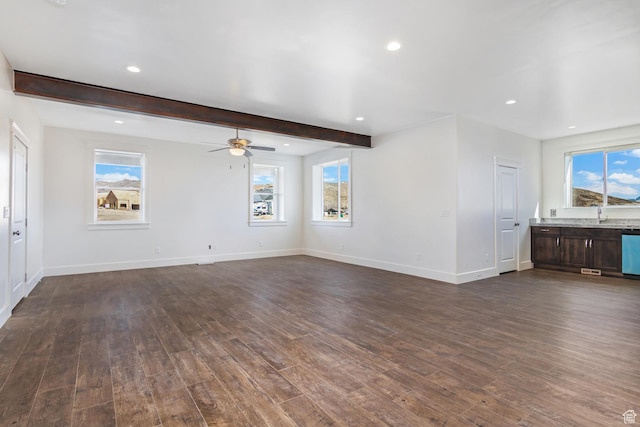 1595 E Duggan Dr, Eagle Mountain, UT 84005 - unfurnished living room with beamed ceiling, ceiling fan, dark hardwood / wood-style floors, and a wealth of natural light