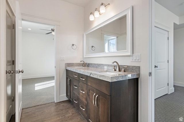 1595 E Duggan Dr, Eagle Mountain, UT 84005 - bathroom featuring vanity, wood-type flooring, and ceiling fan