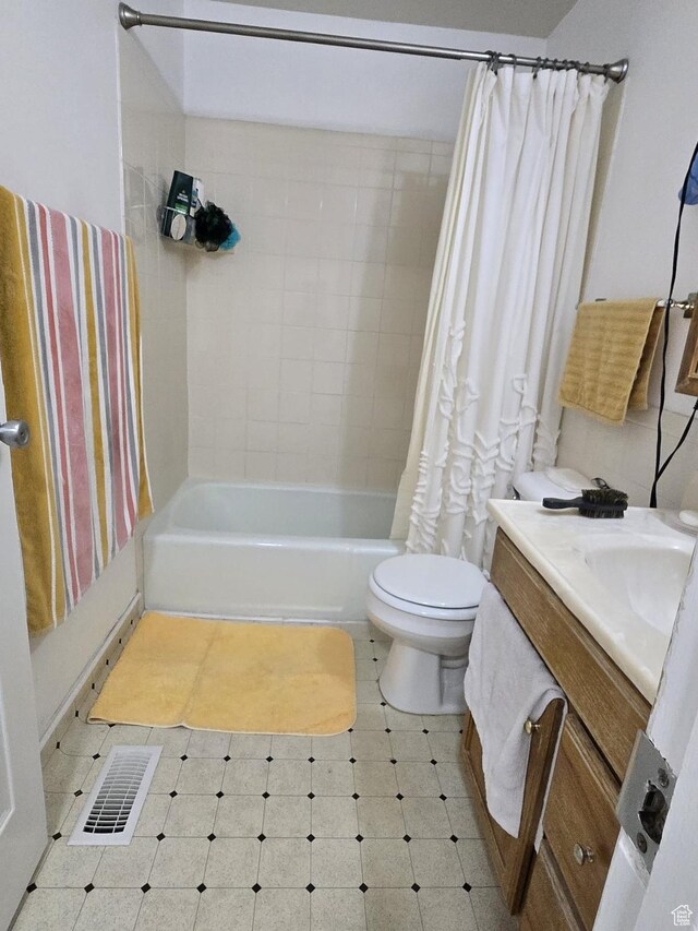 3673 S 2200th St W Unit 13, West Valley City, UT 84119 - full bathroom with shower / bath combo, vanity, and toilet