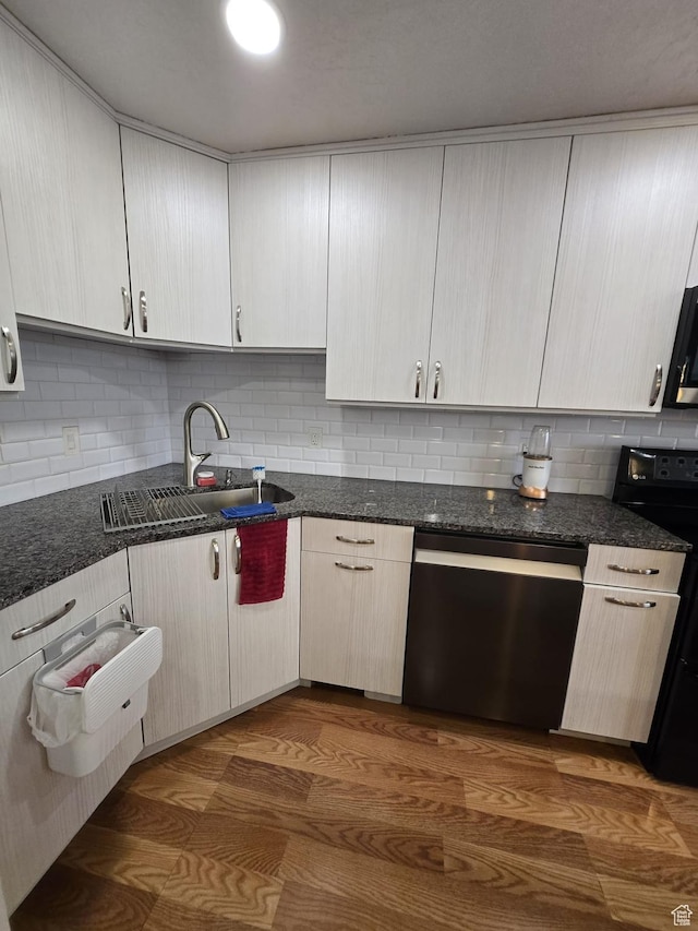 3673 S 2200th St W Unit 13, West Valley City, UT 84119 - kitchen featuring tasteful backsplash, dishwasher, sink, dark stone counters, and electric range