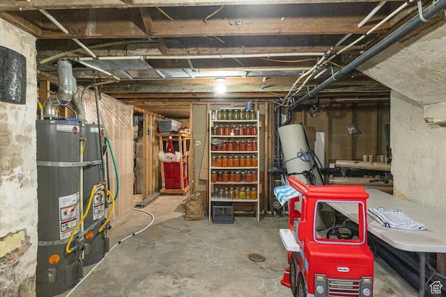 basement with strapped water heater