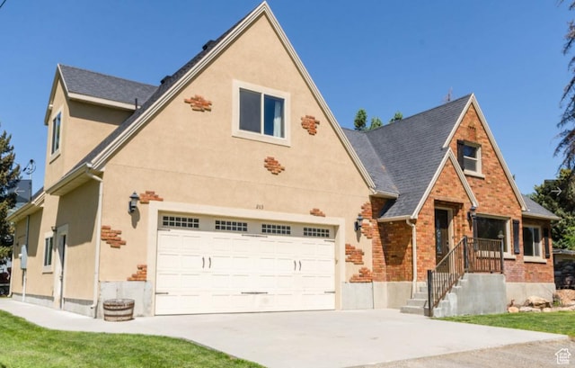 view of front of home with a garage