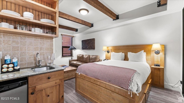 1476 Newpark Blvd Unit 210, Park City, UT 84098 - bedroom featuring dark hardwood / wood-style flooring, indoor wet bar, and beamed ceiling