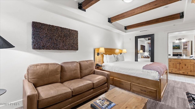 1476 Newpark Blvd Unit 210, Park City, UT 84098 - bedroom featuring beam ceiling and ensuite bath