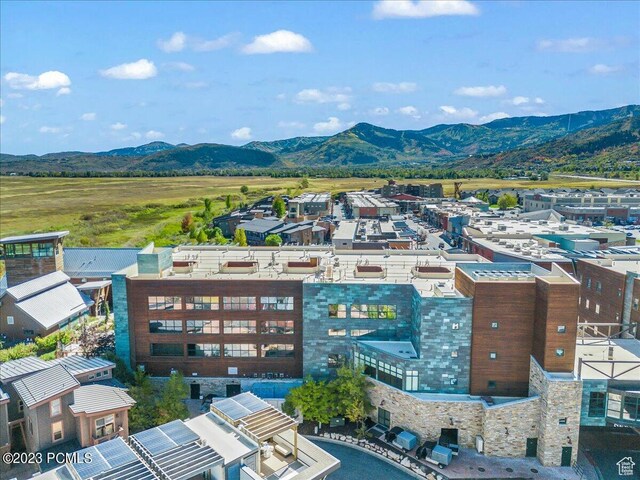 1476 Newpark Blvd Unit 210, Park City, UT 84098 - drone / aerial view with a mountain view