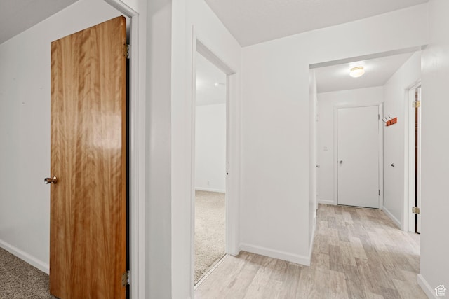 corridor featuring light hardwood / wood-style flooring
