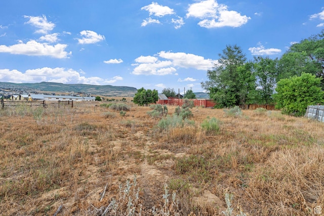 view of mountain feature with a rural view