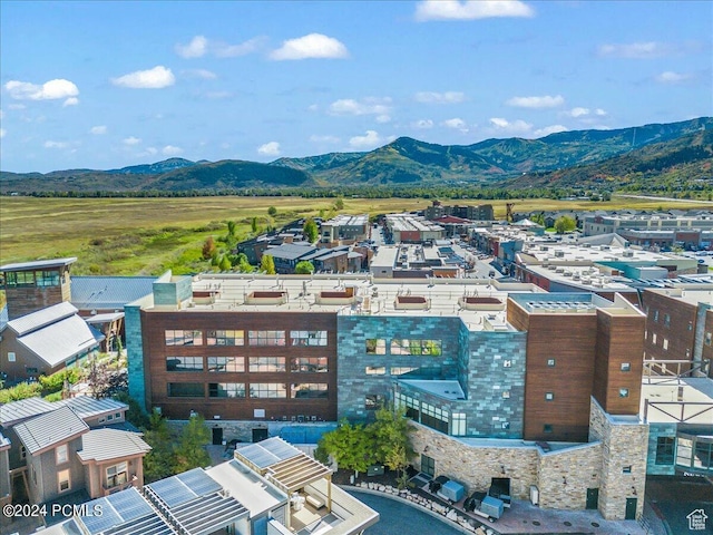 1456 Newpark Blvd Unit 215, Park City, UT 84098 - drone / aerial view with a mountain view