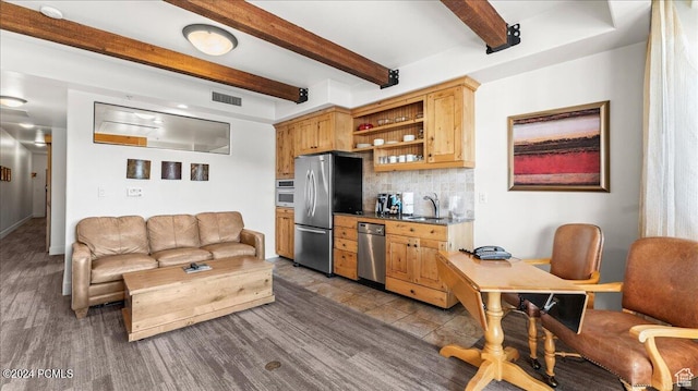 1456 Newpark Blvd Unit 215, Park City, UT 84098 - kitchen with light brown cabinetry, tasteful backsplash, sink, stainless steel appliances, and beam ceiling