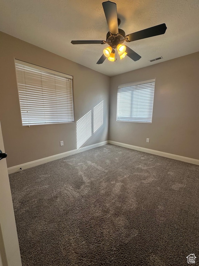 1288 N Cedar Blvd Unit 38-F, Cedar City, UT 84721 - carpeted spare room featuring ceiling fan and a textured ceiling