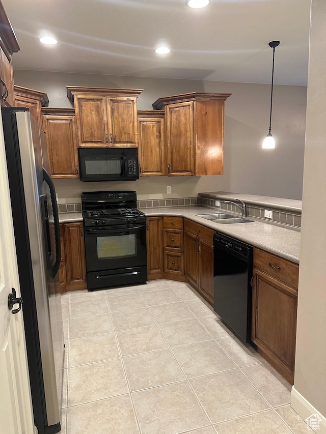 1288 N Cedar Blvd Unit 38-F, Cedar City, UT 84721 - kitchen with sink, decorative light fixtures, black appliances, and light tile patterned floors