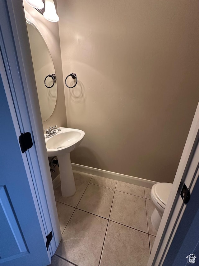 1288 N Cedar Blvd Unit 38-F, Cedar City, UT 84721 - bathroom with tile patterned floors, toilet, and sink