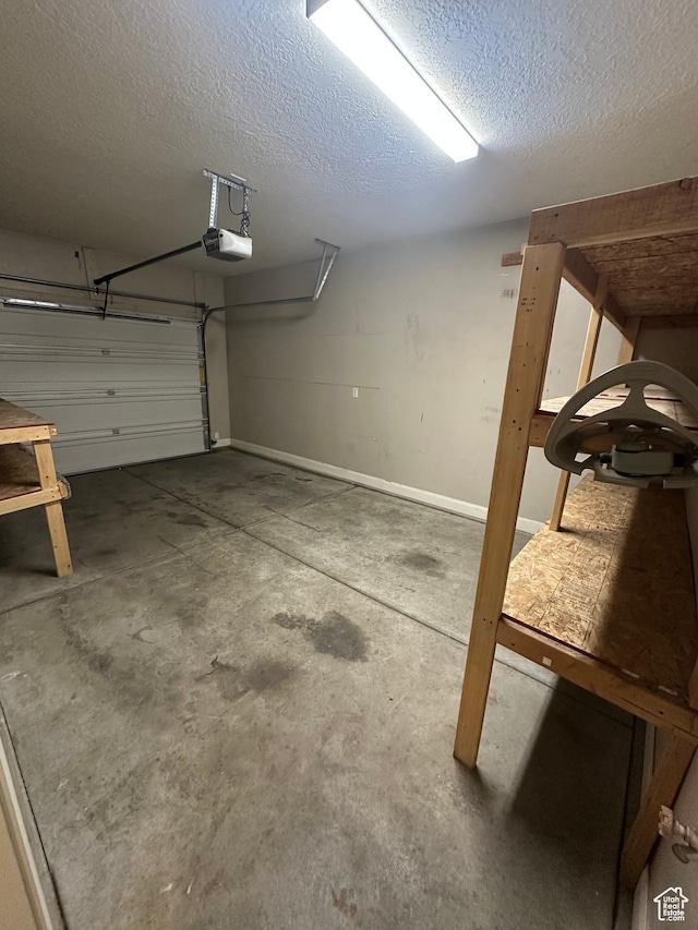 1288 N Cedar Blvd Unit 38-F, Cedar City, UT 84721 - garage featuring a garage door opener