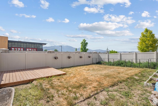 3731 N Tumwater Dr W, Eagle Mountain, UT 84005 - view of yard with a deck with mountain view