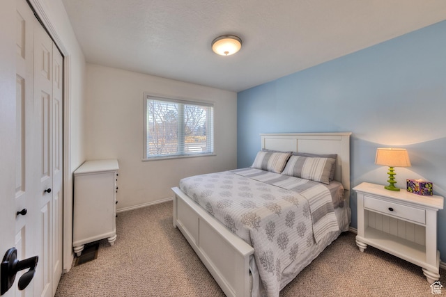 4230 S Beeman Rd, Moab, UT 84532 - bedroom with light colored carpet and a closet
