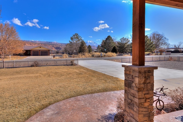 4230 S Beeman Rd, Moab, UT 84532 - view of yard featuring a mountain view and a patio area