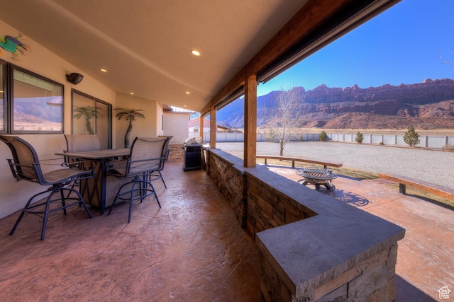 4230 S Beeman Rd, Moab, UT 84532 - view of patio featuring a mountain view and an outdoor bar